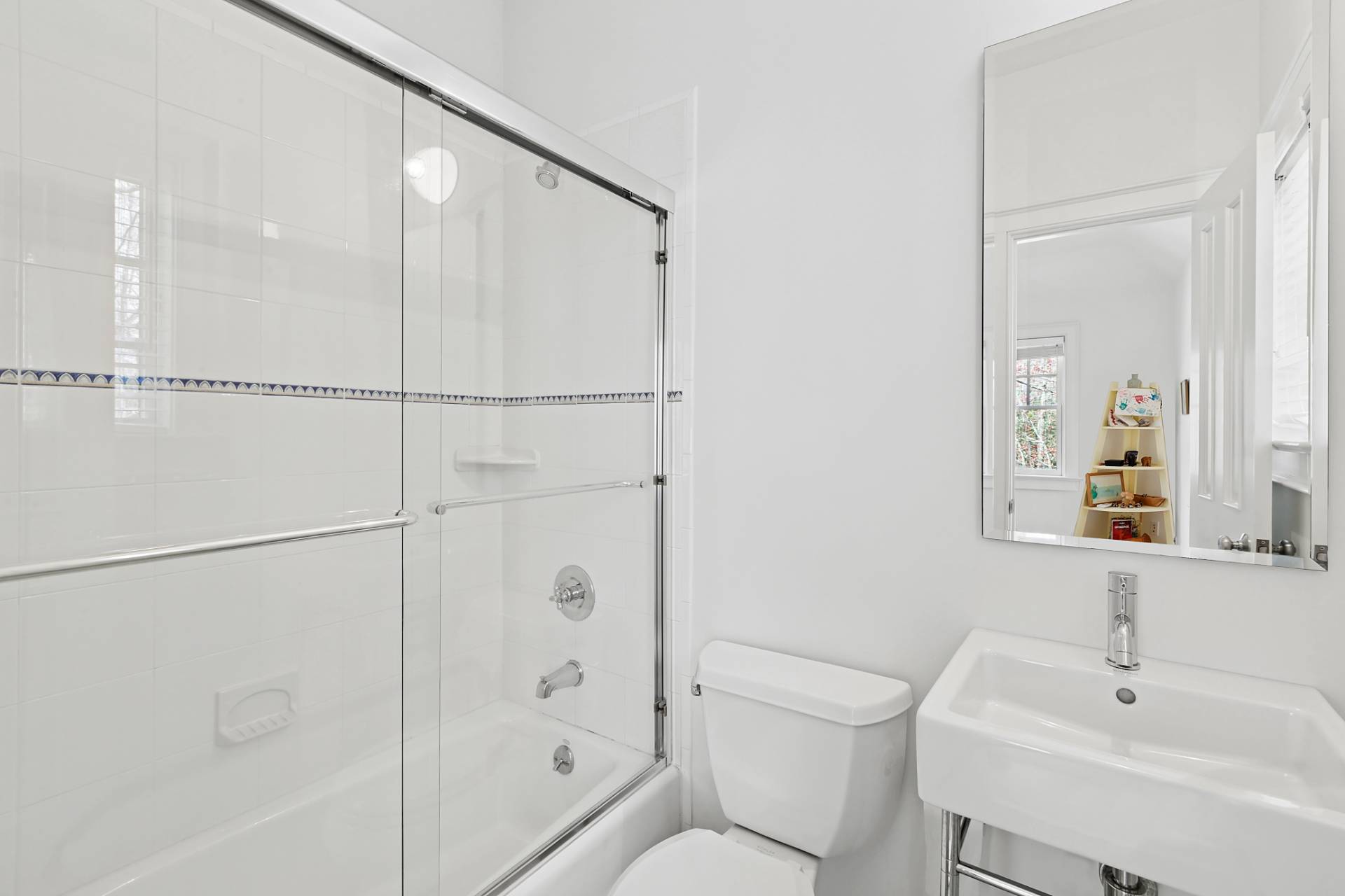 27 Gardiners Path Sag Harbor, NY 11963 - Photo 20 of 27 a bathroom with a bathtub shower sink vanity and toilet