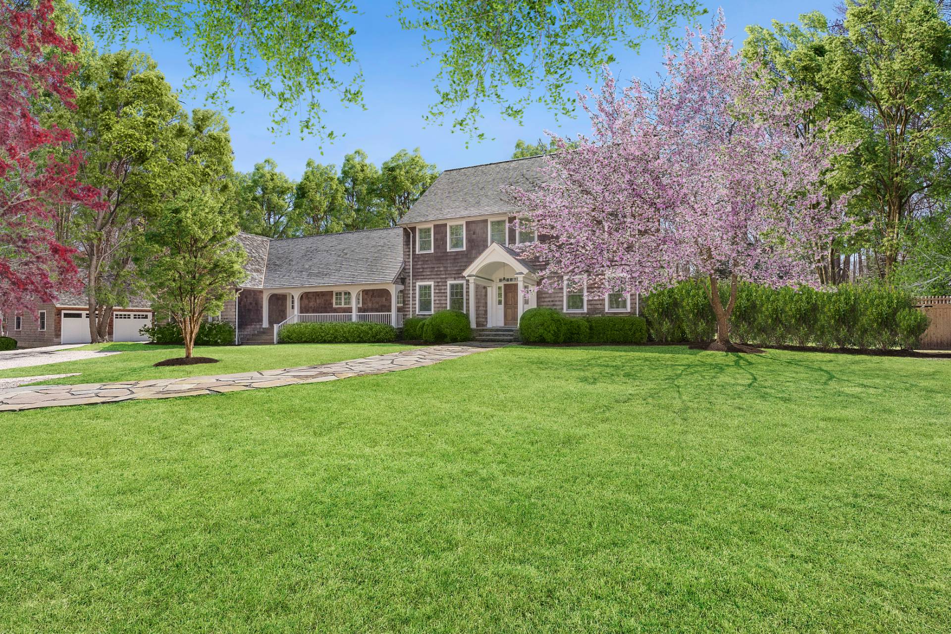 27 Gardiners Path Sag Harbor, NY 11963 - Photo 2 of 27 a front view of house with yard and green space
