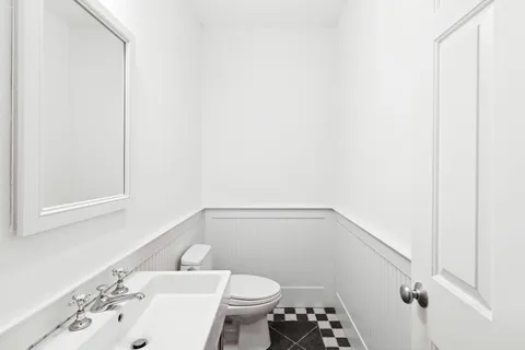 a bathroom with a sink and a toilet