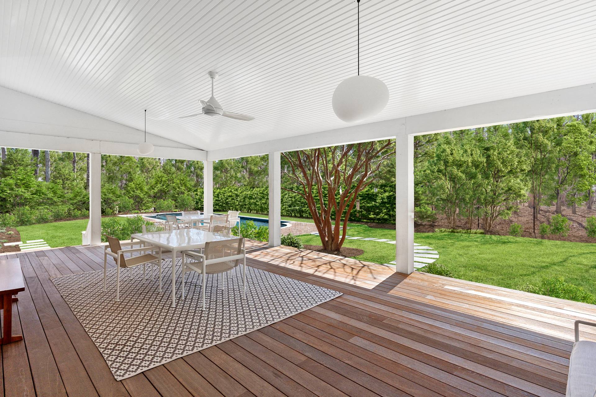 27 Gardiners Path Sag Harbor, NY 11963 - Photo 24 of 27 a view of a patio with chairs and floor to ceiling window