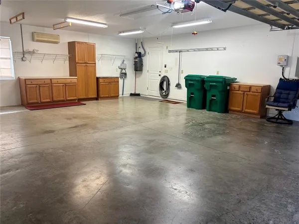a view of kitchen with furniture and window