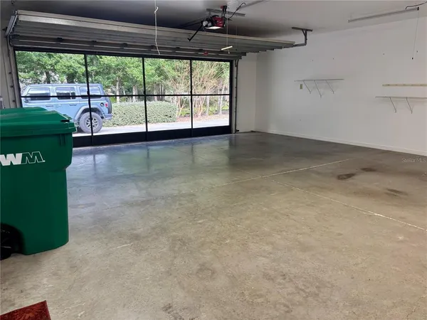 a view of a room with a large window