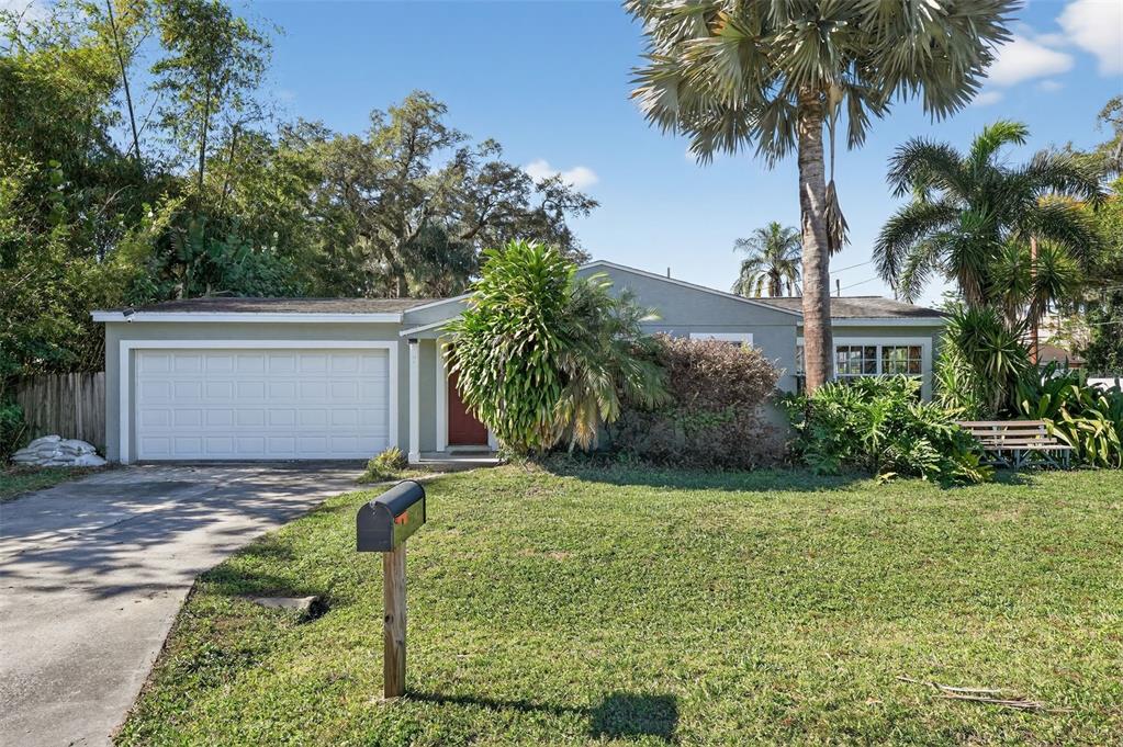 700 28th Street Orlando, FL 32805 - Photo 19 of 19 a view of a house with a yard and potted plants