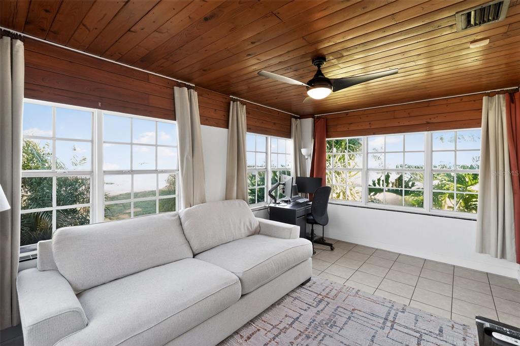 700 28th Street Orlando, FL 32805 - Photo 9 of 19 a living room with furniture and a large window