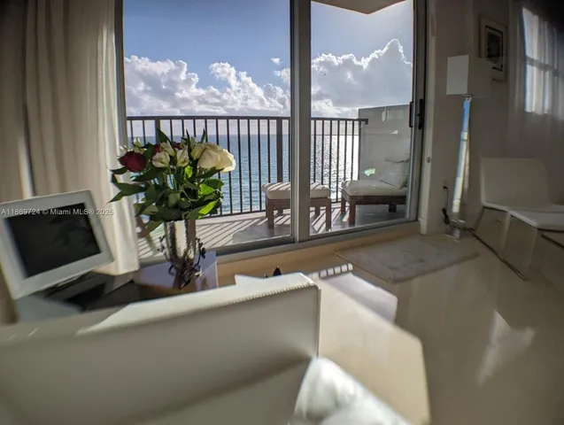 a vase of flowers sitting on a table