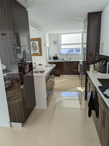 a view of utility room with a sink