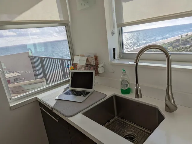 a living room with furniture and window