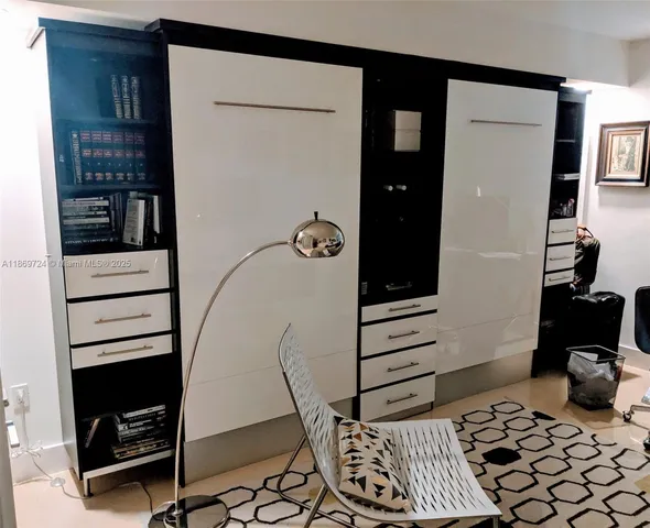 a bathroom with a sink toilet a mirror and shower