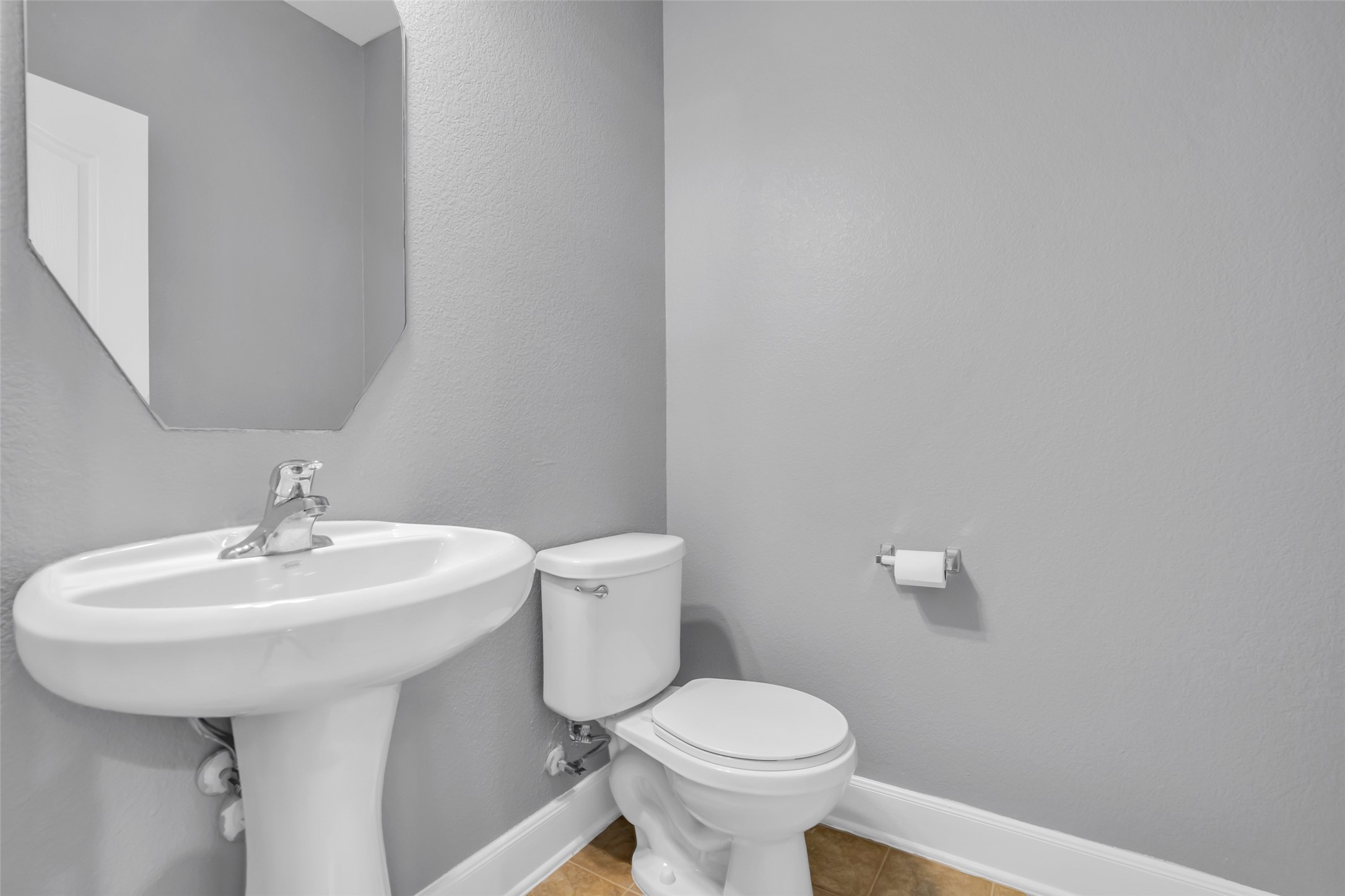 2707 Volute Houston, TX 77038 - Photo 15 of 28 Half bath located on the first floor, convenient for guests and daily use.