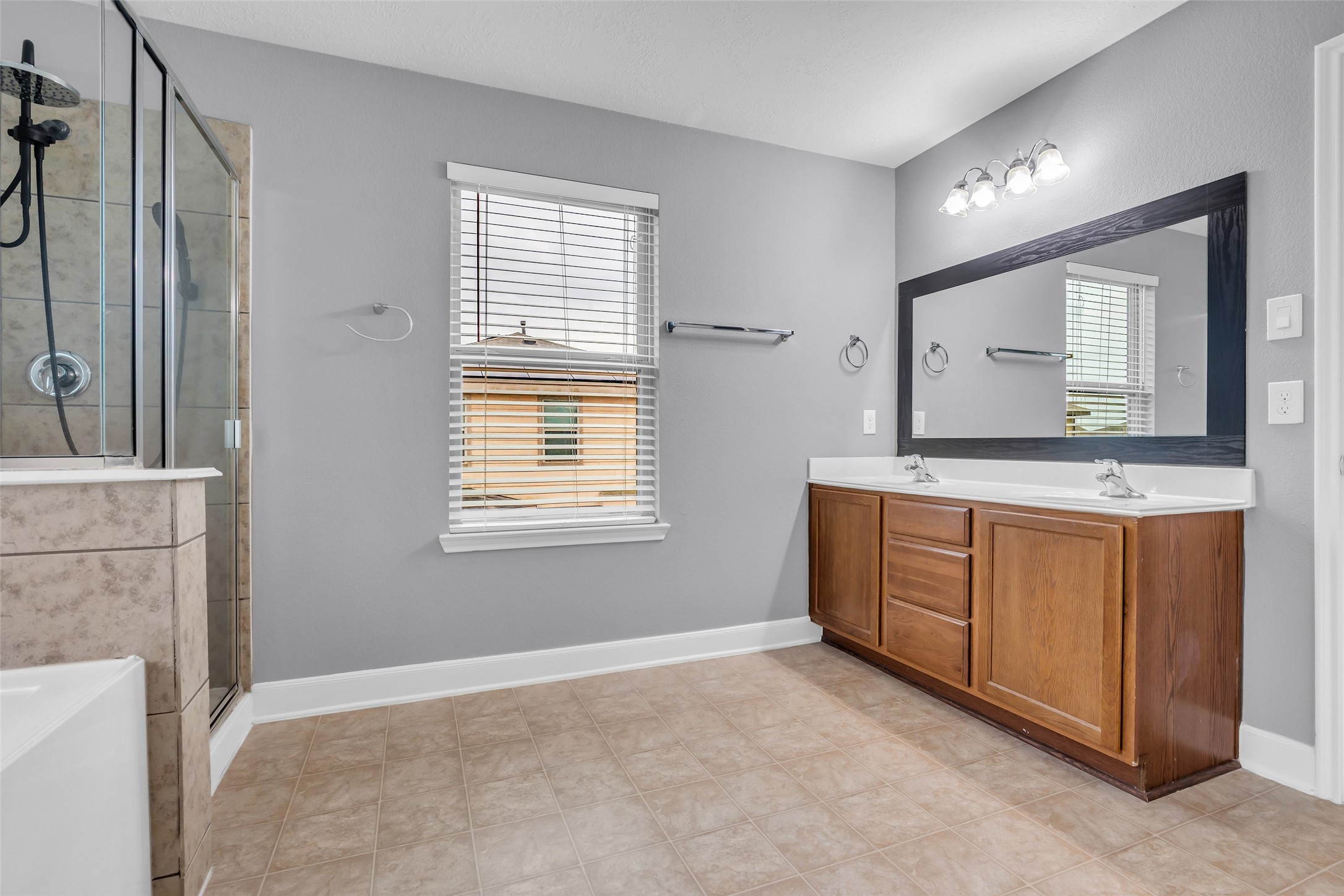 2707 Volute Houston, TX 77038 - Photo 18 of 28 It includes a spacious private bathroom designed for everyday comfort and convenience.