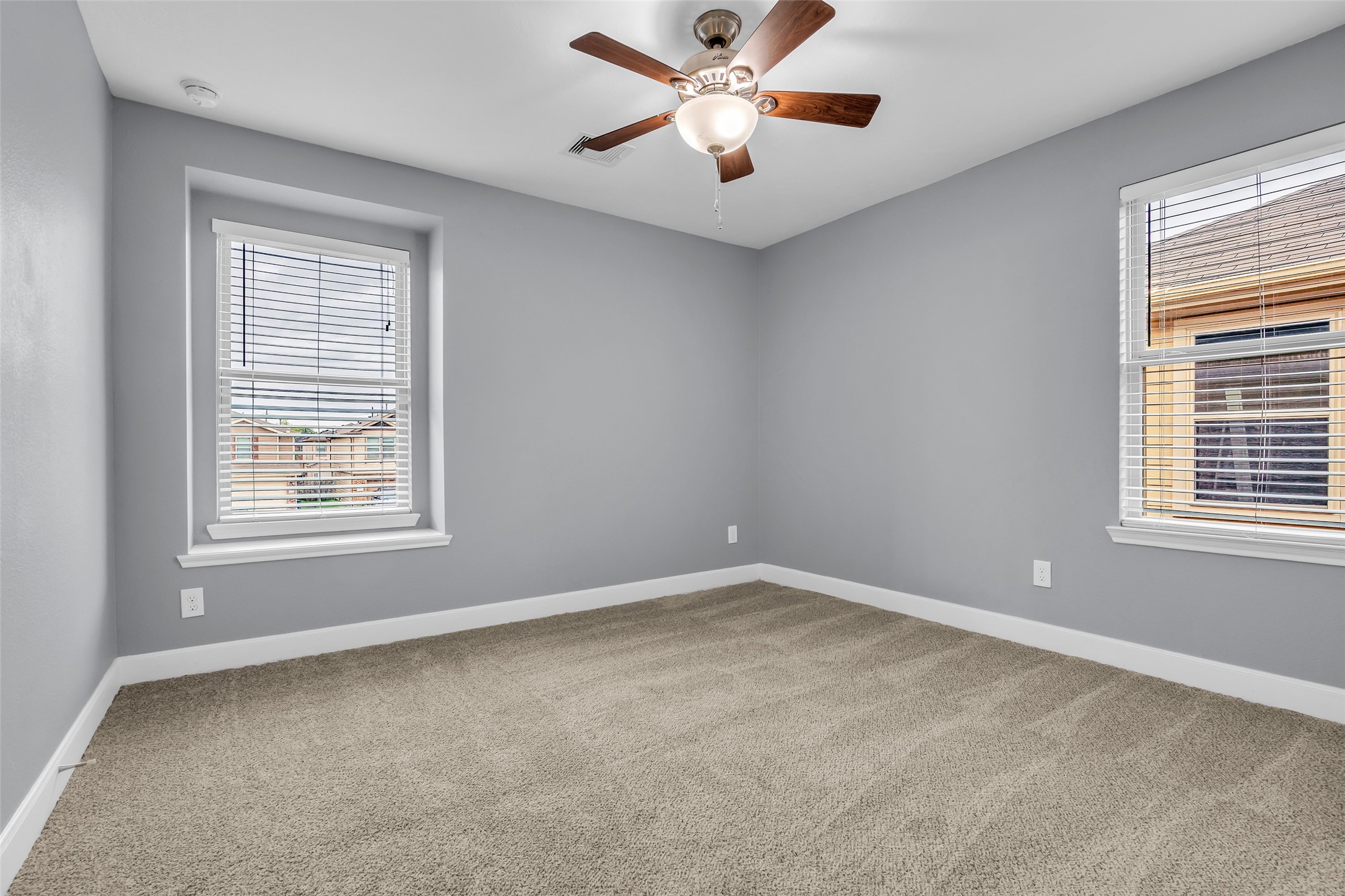 2707 Volute Houston, TX 77038 - Photo 22 of 28 Another secondary bedroom with similar features, including carpeted flooring and a comfortable layout that can be easily personalized to suit your needs.