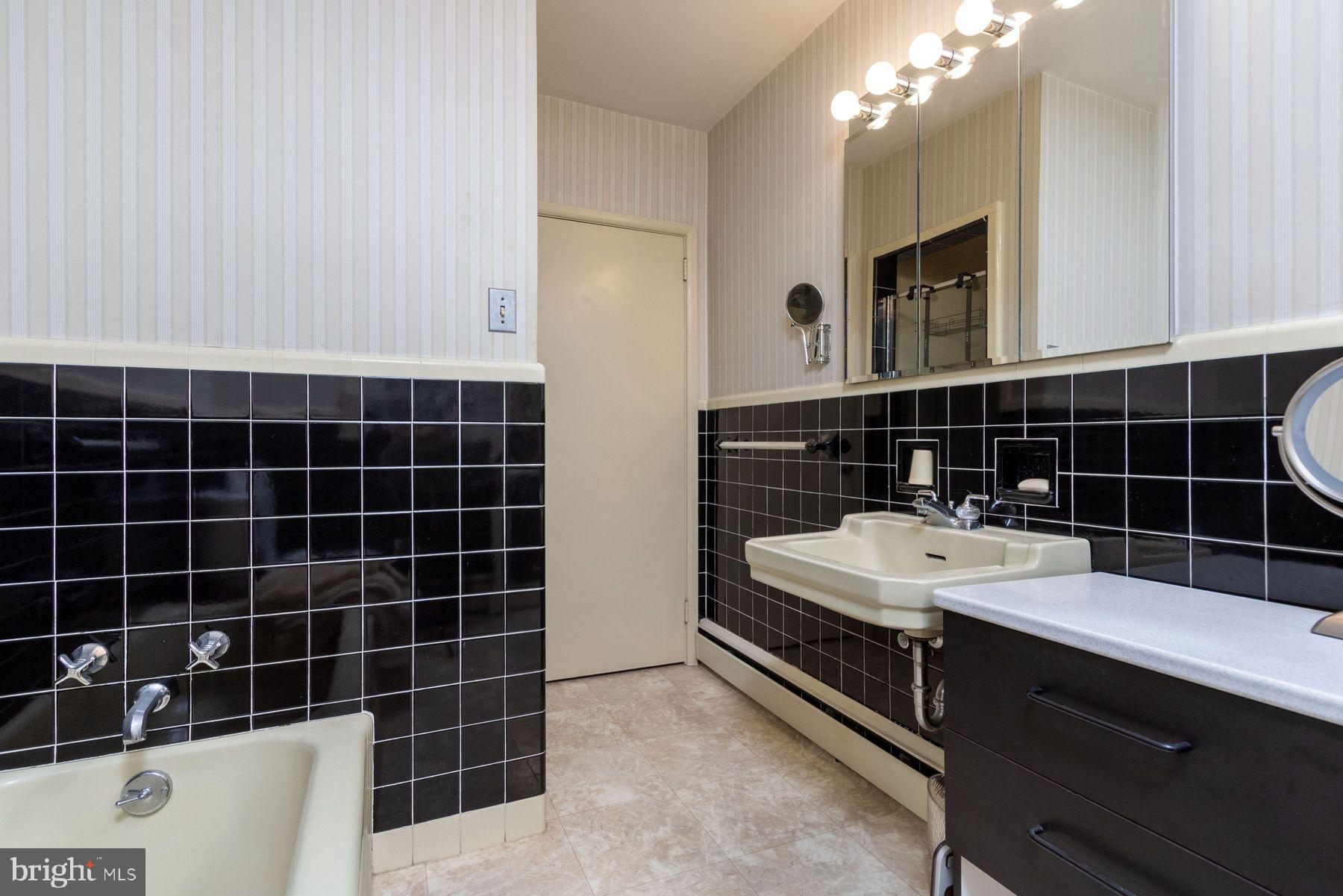 2349 Valley Road Jamison, PA 18929 - Photo 30 of 53 a bathroom with a sink a toilet and blue shower