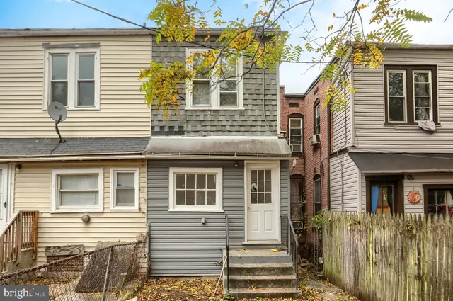 a view of a house with a window and wooden floor