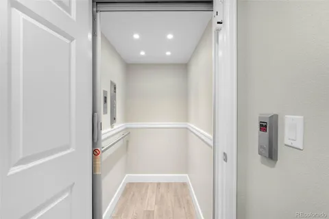 a view of a hallway with white walls