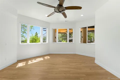 a view of an empty room with windows