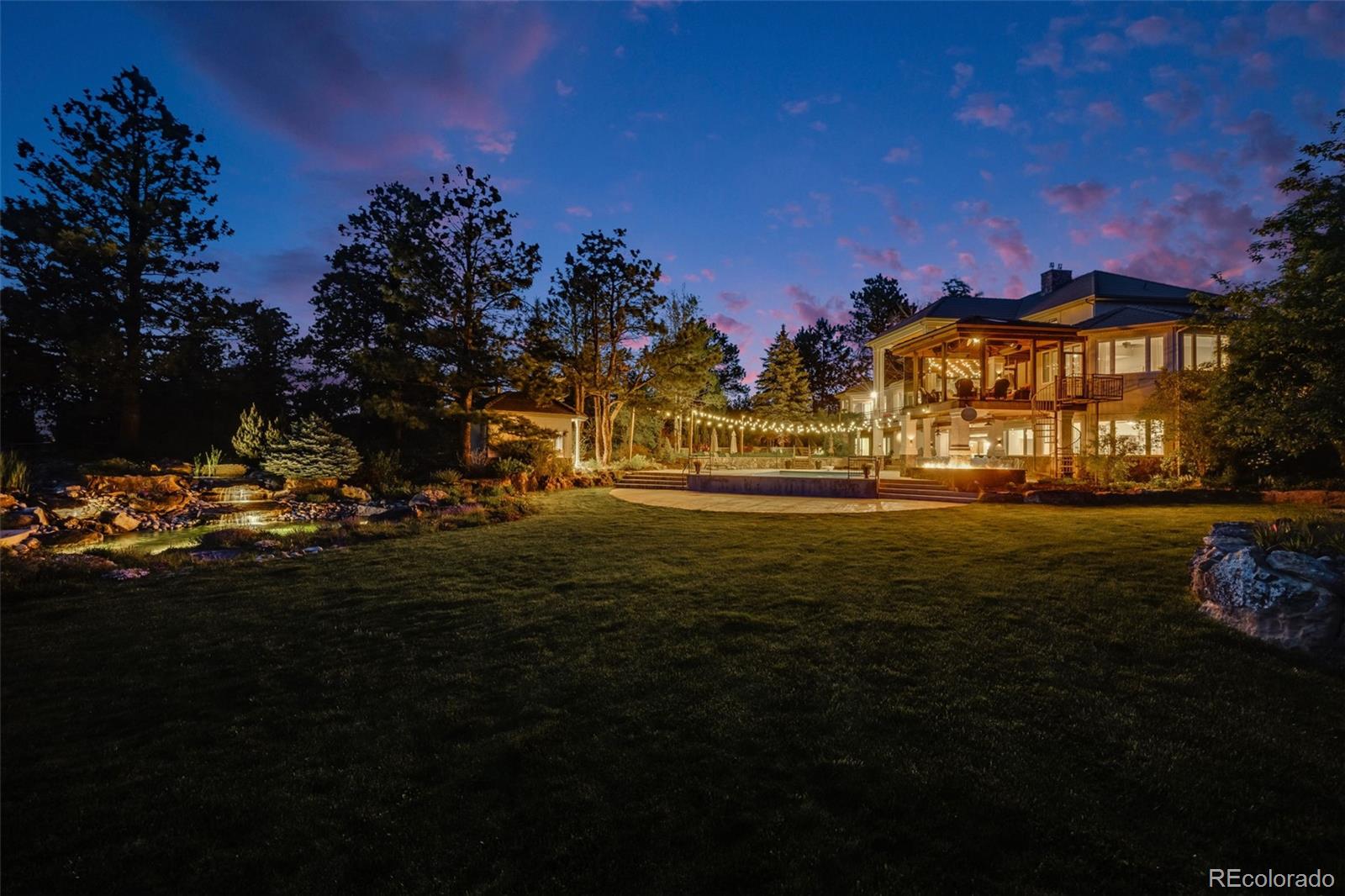 10914 Remmick Ridge Road Parker, CO 80134 - Photo 46 of 47 a view of a building and a yard