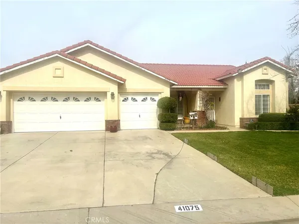 a view of a house with a swimming pool