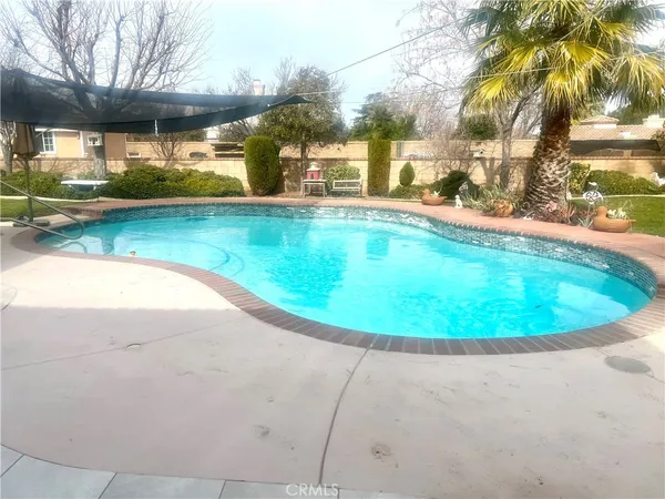 a view of a house with a swimming pool