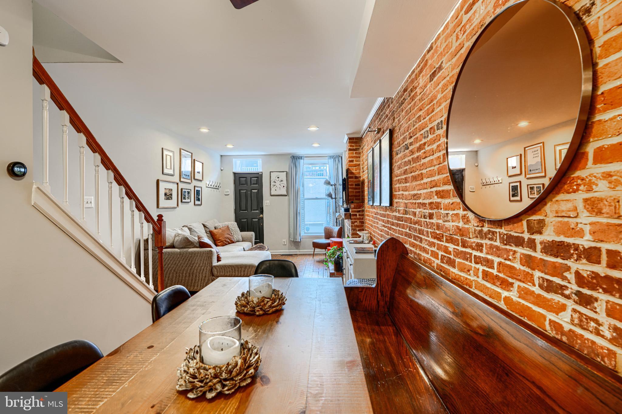 438 East Clement Street Baltimore, MD 21230 - Photo 12 of 47 a living room with furniture and a mirror