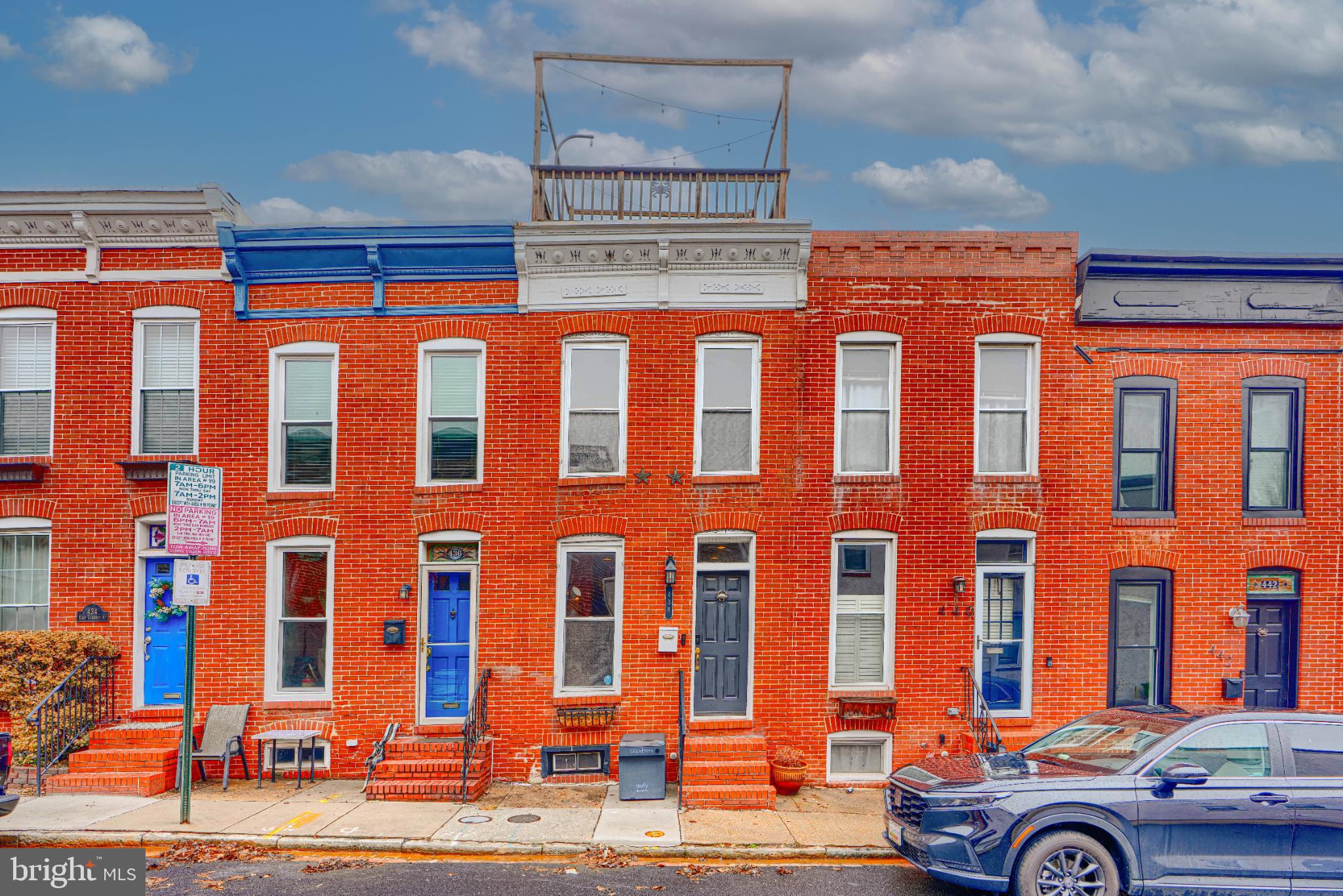 438 East Clement Street Baltimore, MD 21230 - Photo 4 of 47 a front view of a building with glass windows
