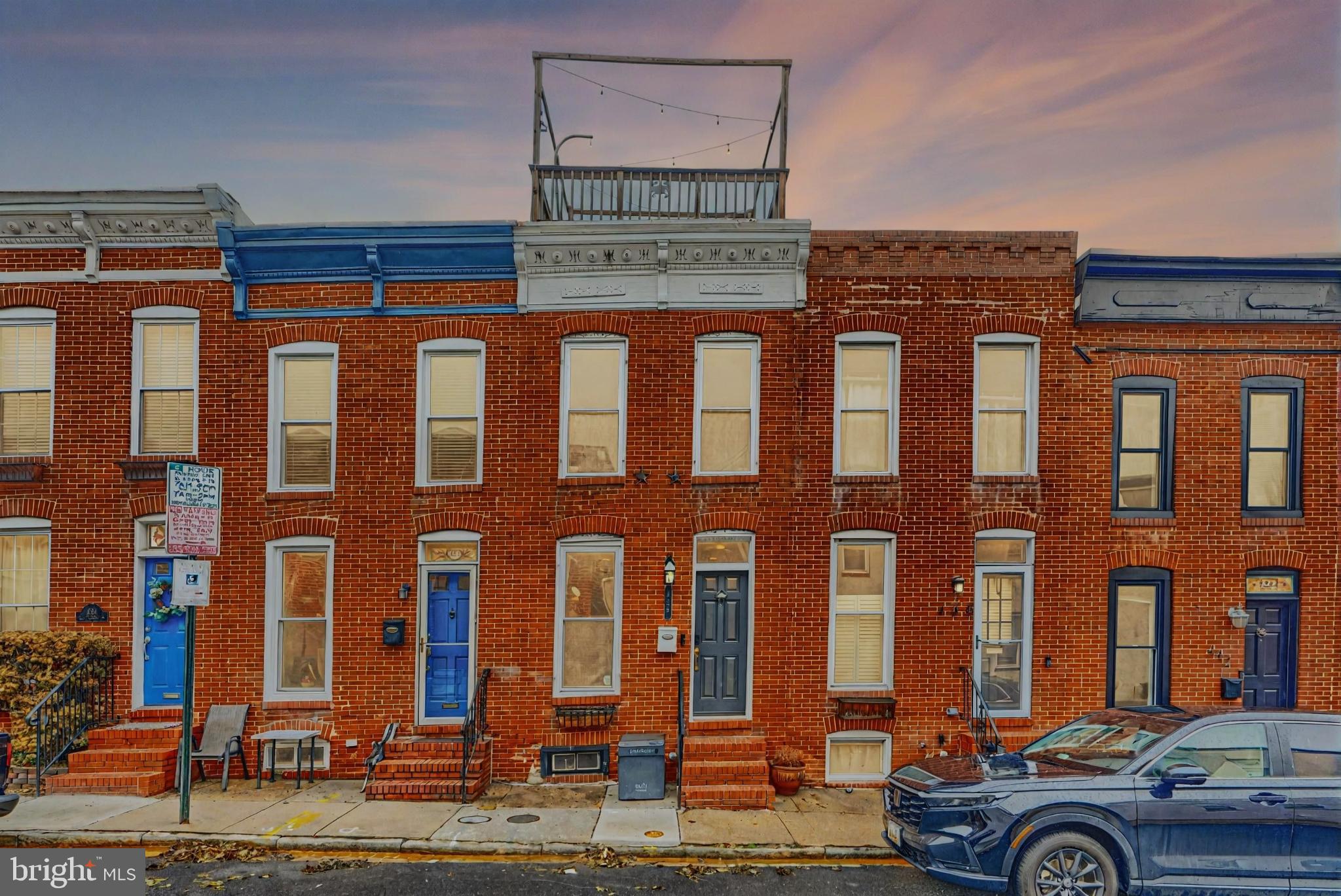 438 East Clement Street Baltimore, MD 21230 - Photo 46 of 47 front view of a building with car parked