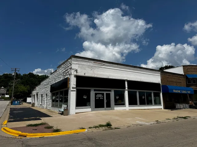 a front view of a house with yard