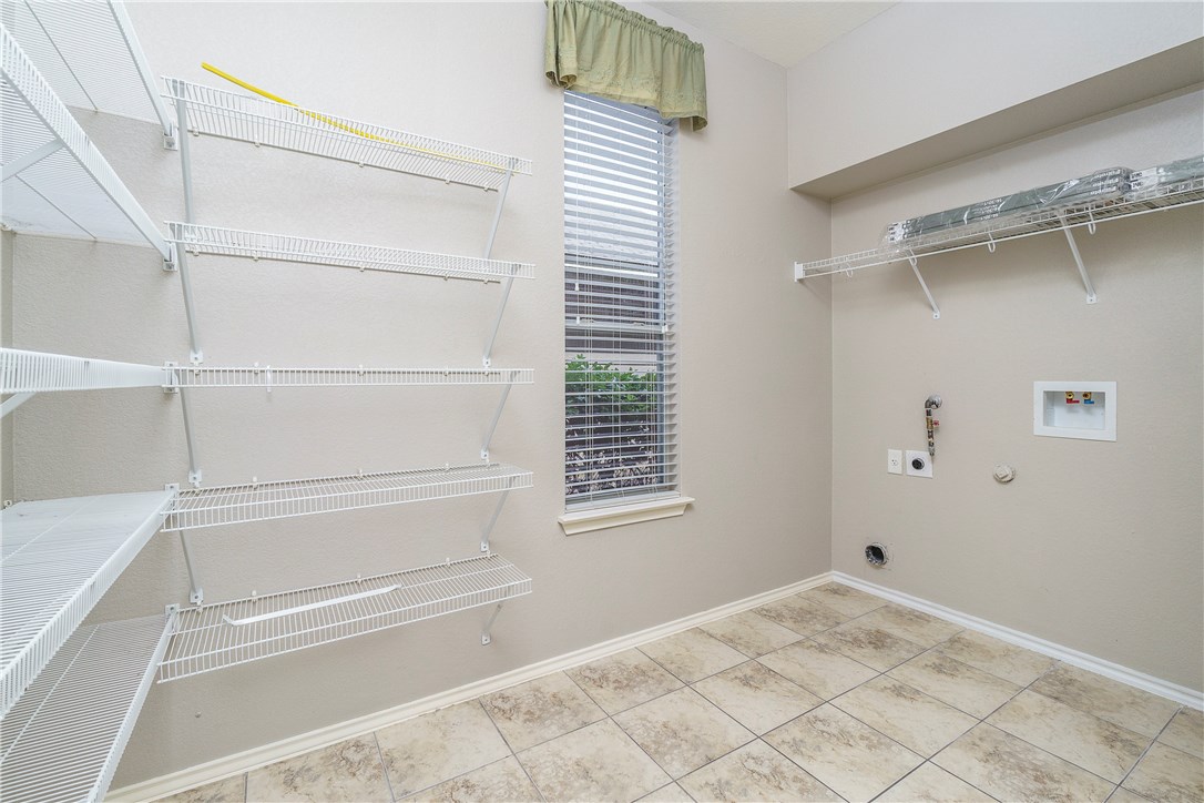 8528 Harrier Drive, Unit 233 Austin, TX 78729 - Photo 27 of 27 a view of an empty walk in closet
