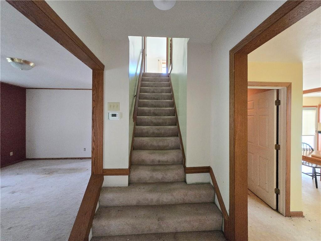 1731 Pulaski Road New Castle, PA 16105 - Photo 14 of 27 Stairwell between kitchen/dining and Family room
