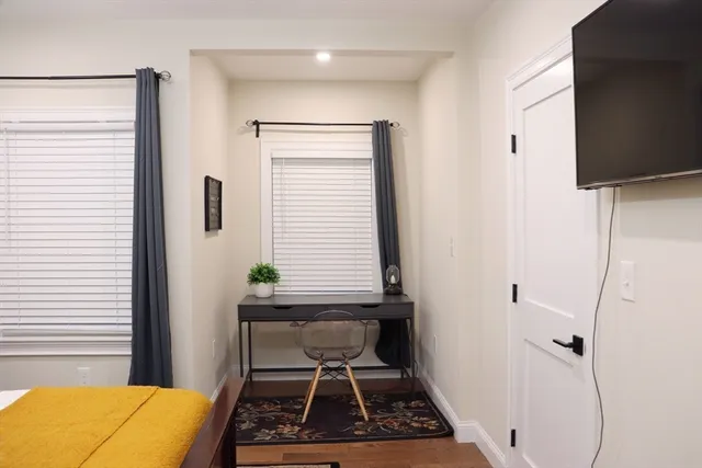 a room with furniture and a window