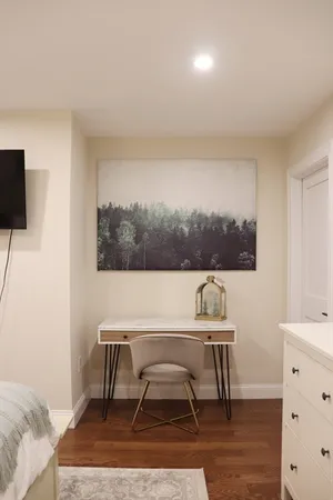 a workspace with furniture and window