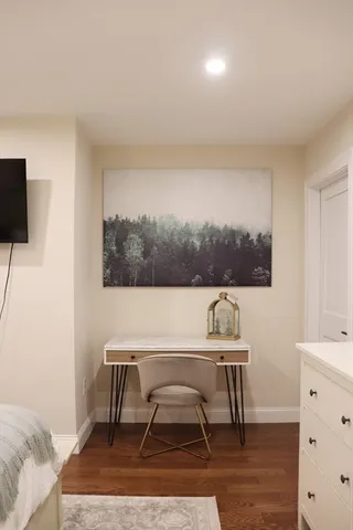 a workspace with furniture and window