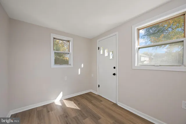 an empty room with windows