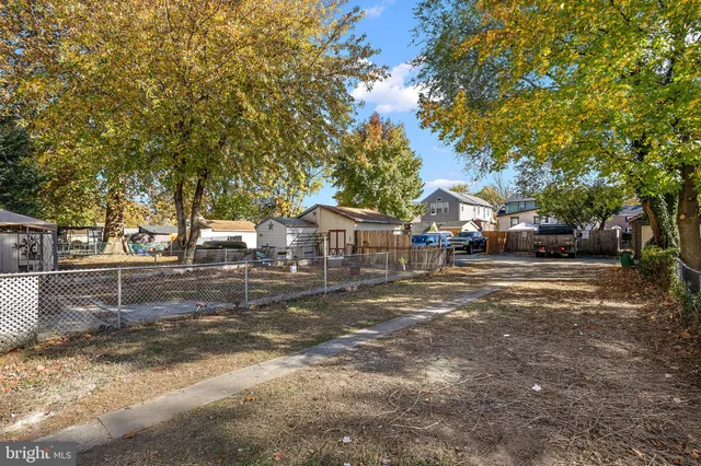 a view of street with parked cars