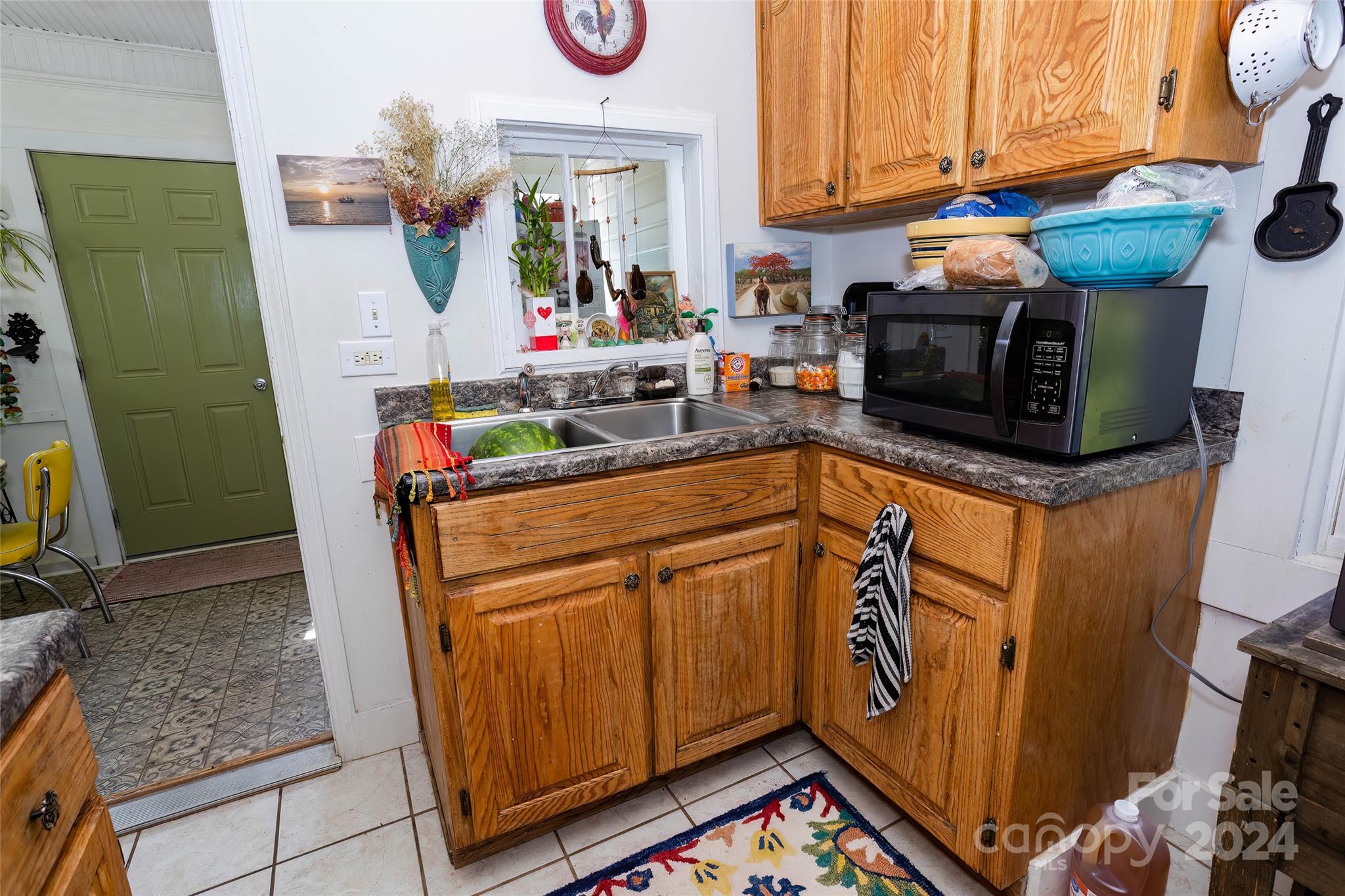 3786 Broad Street Clyde, NC 28721 - Photo 17 of 48 a view of a kitchen with appliances and cabinets