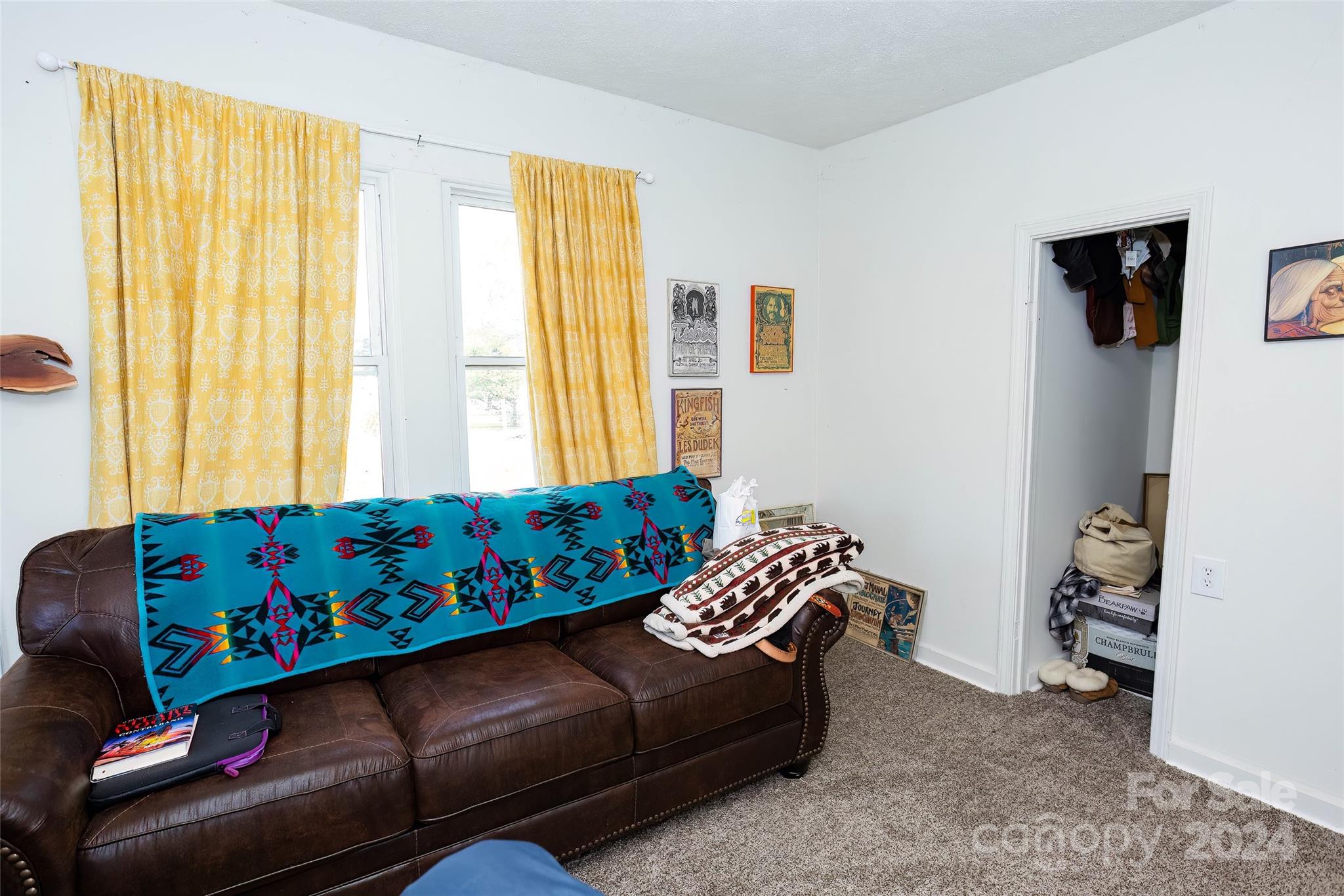 3786 Broad Street Clyde, NC 28721 - Photo 21 of 48 a living room with furniture and a window