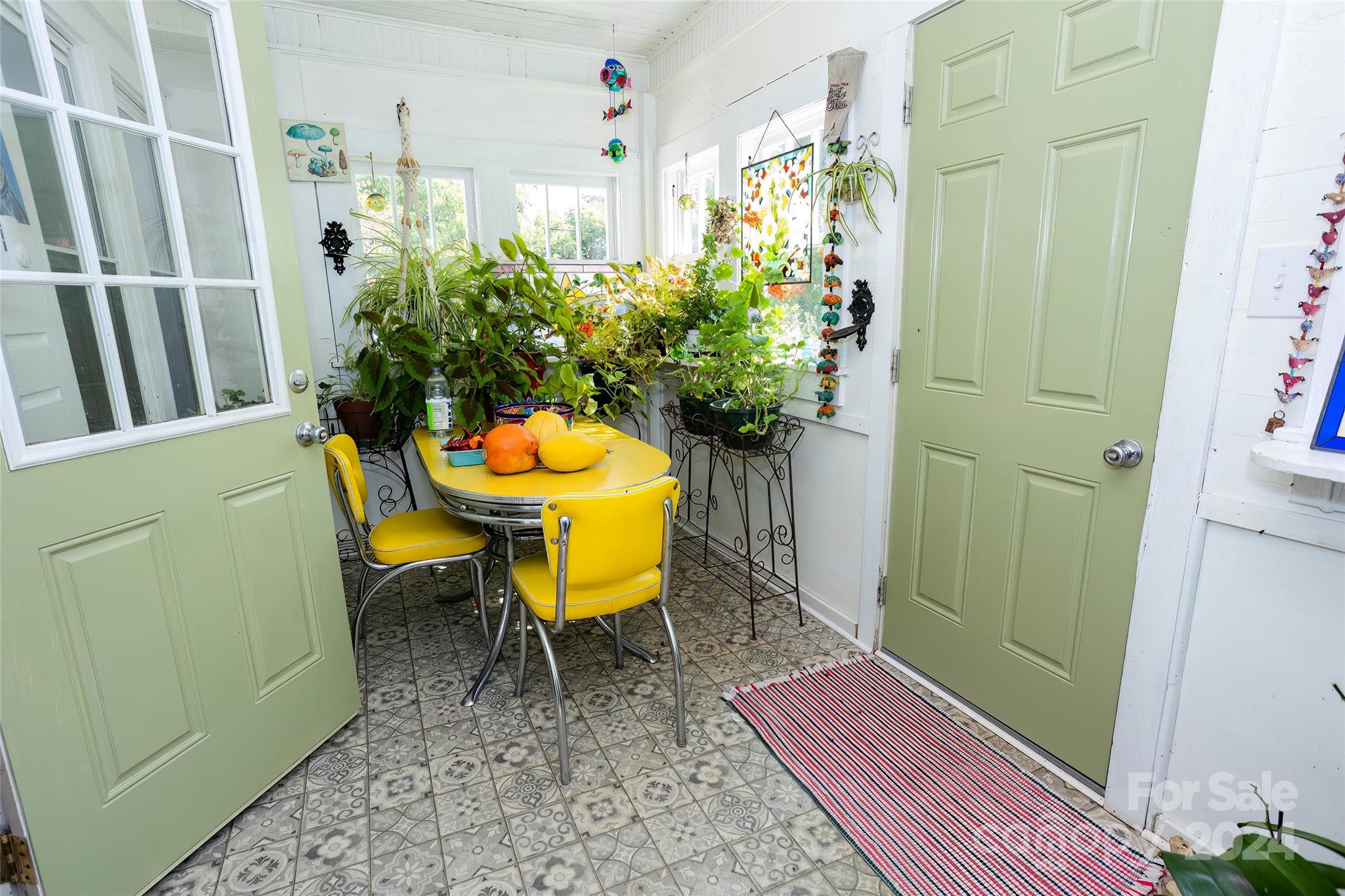 3786 Broad Street Clyde, NC 28721 - Photo 25 of 48 a view of a room that has a table and chairs in it