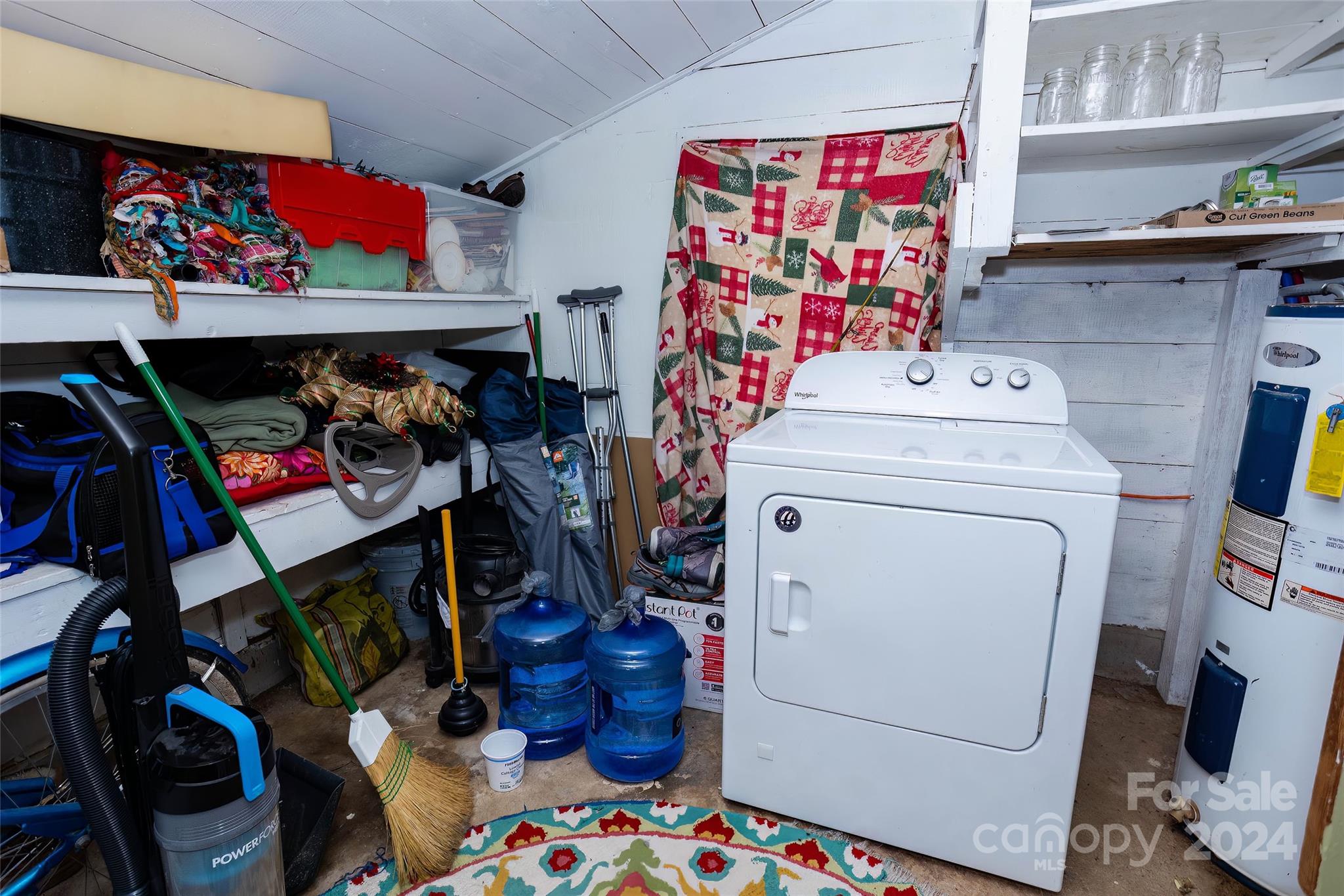 3786 Broad Street Clyde, NC 28721 - Photo 29 of 48 a utility room with dryer and washer