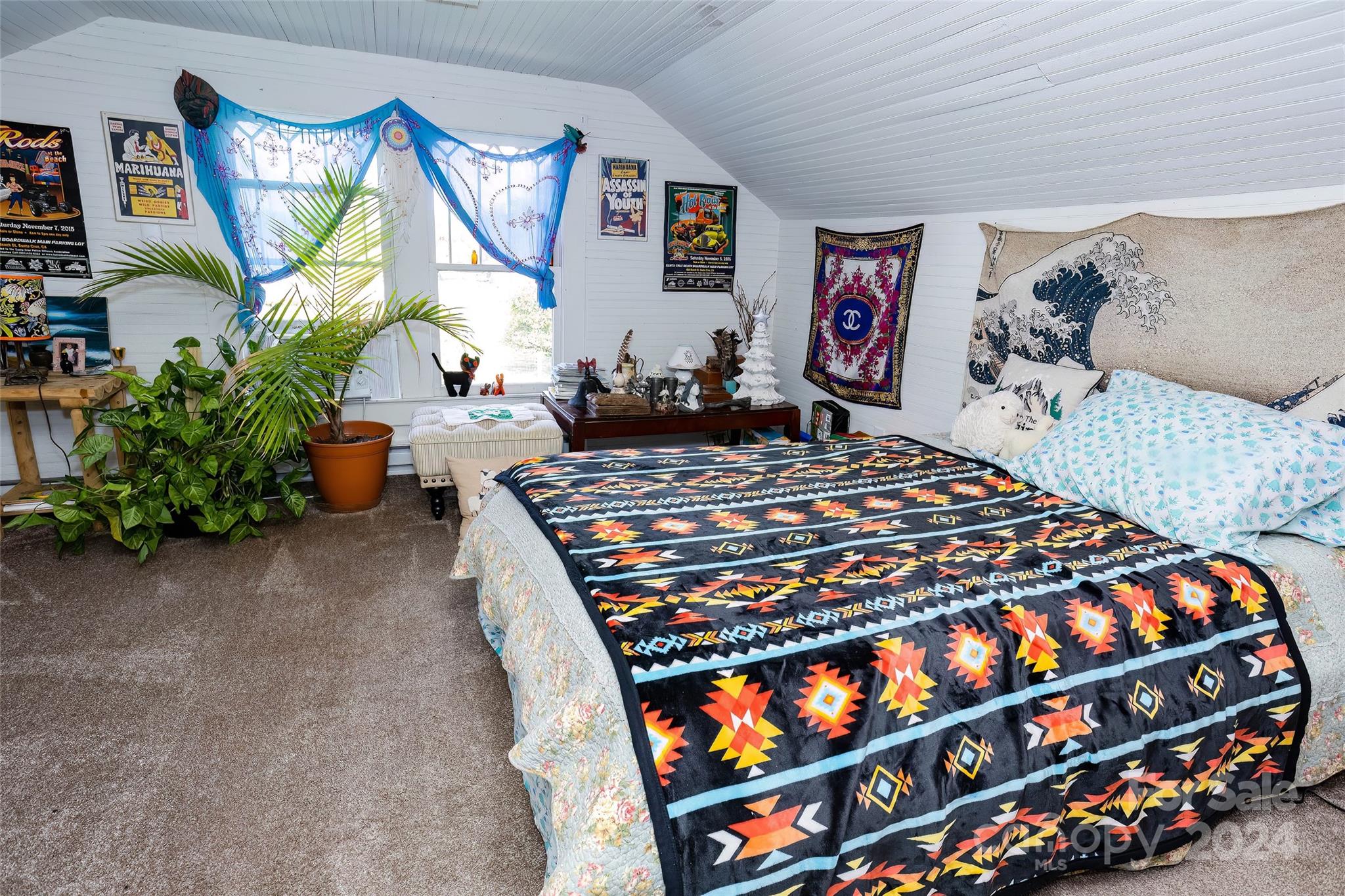 3786 Broad Street Clyde, NC 28721 - Photo 30 of 48 a bedroom with a bed and dresser