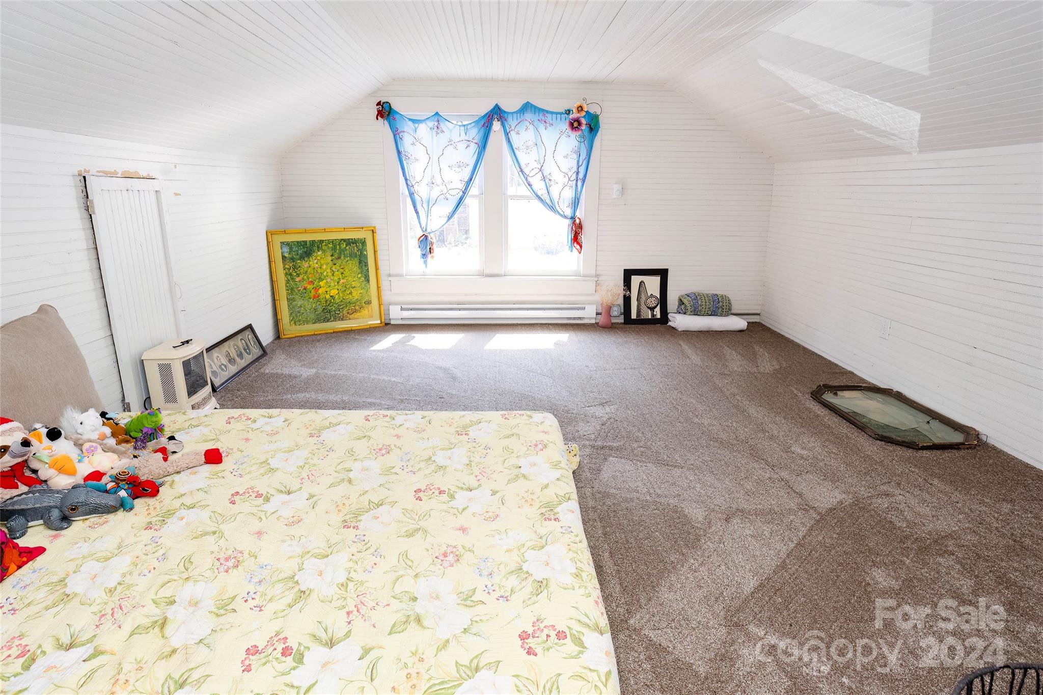 3786 Broad Street Clyde, NC 28721 - Photo 35 of 48 a view of a bedroom with a bed and toys in it