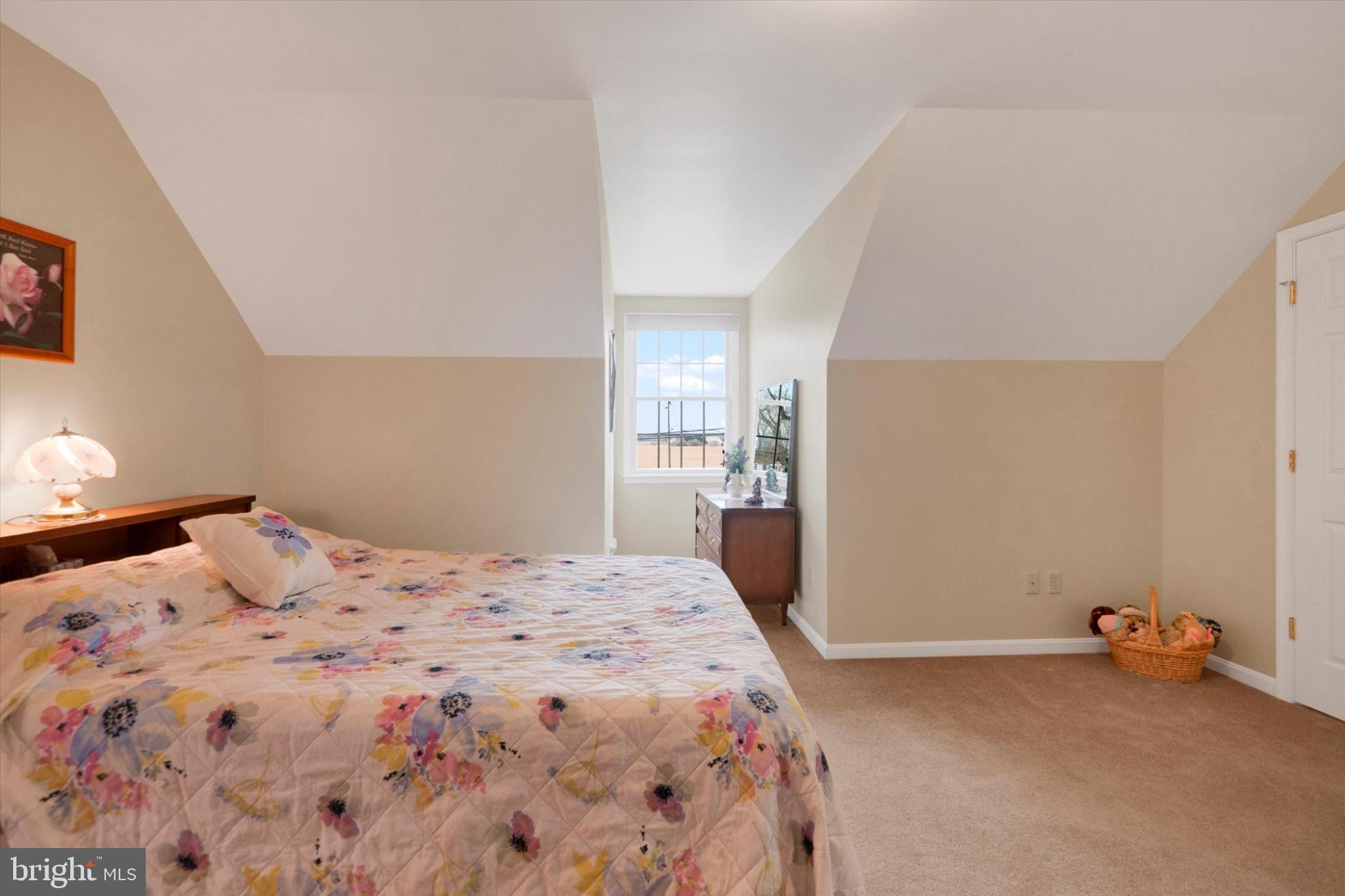 13323 Maugansville Road Hagerstown, MD 21740 - Photo 21 of 27 a bedroom with a bed and a cabinets