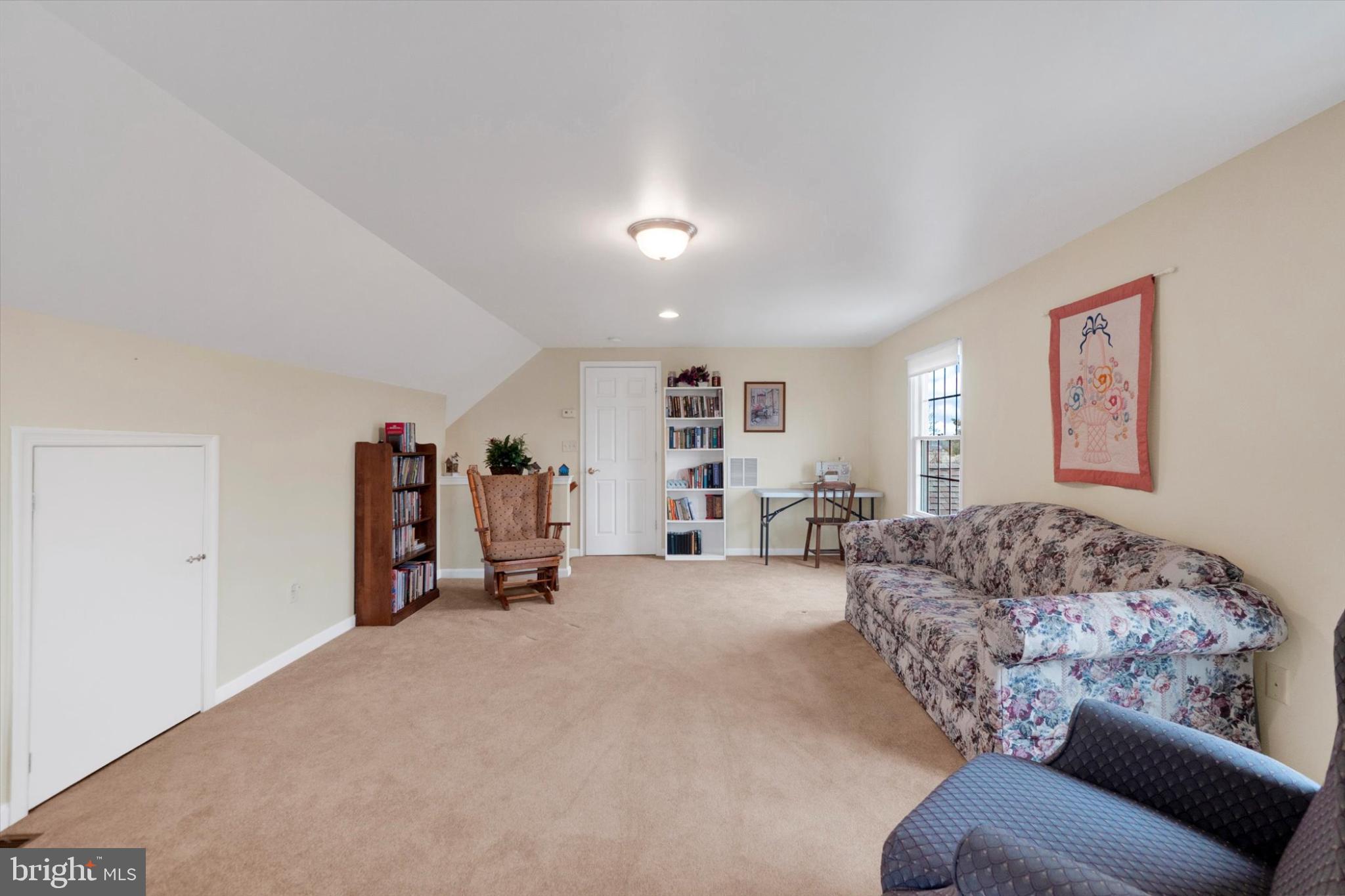 13323 Maugansville Road Hagerstown, MD 21740 - Photo 24 of 27 a living room with furniture and a window