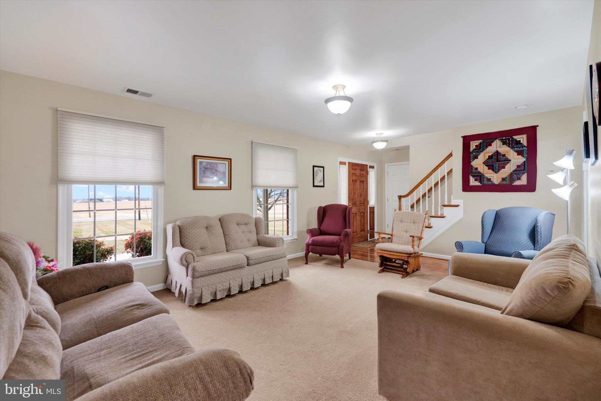 13323 Maugansville Road Hagerstown, MD 21740 - Photo 3 of 27 a living room with furniture and a large window