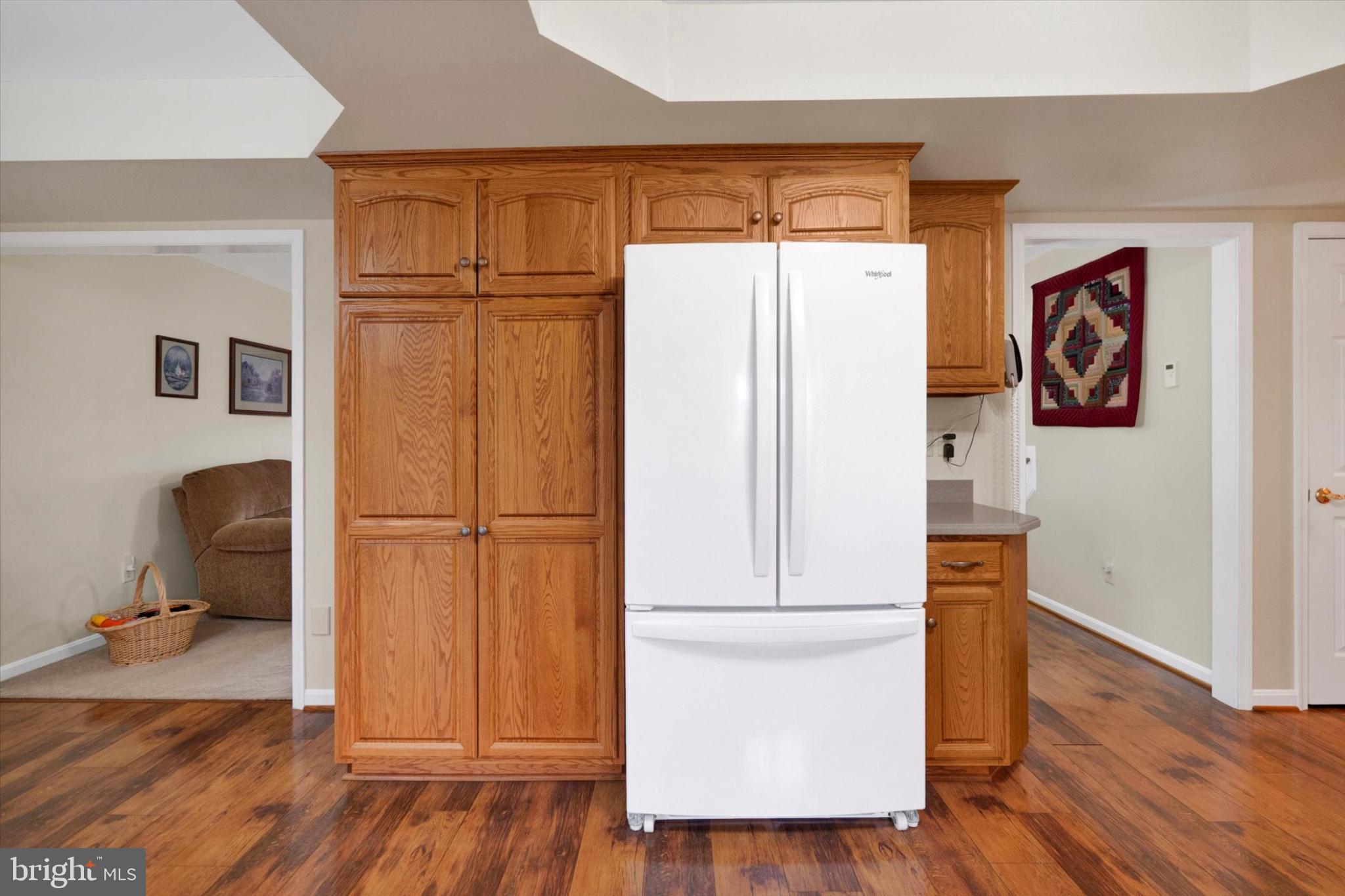 13323 Maugansville Road Hagerstown, MD 21740 - Photo 6 of 27 a white refrigerator freezer sitting inside of a kitchen