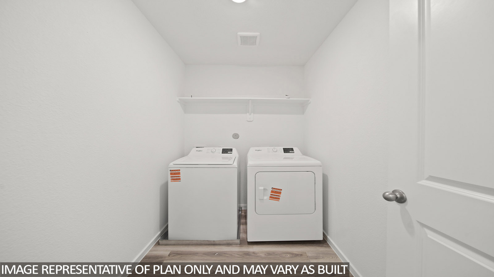 220 Flying Tigers Trail Jarrell, TX 76537 - Photo 20 of 21 Dedicated laundry area featuring wood-finish flooring, white walls, and a white overhead shelf