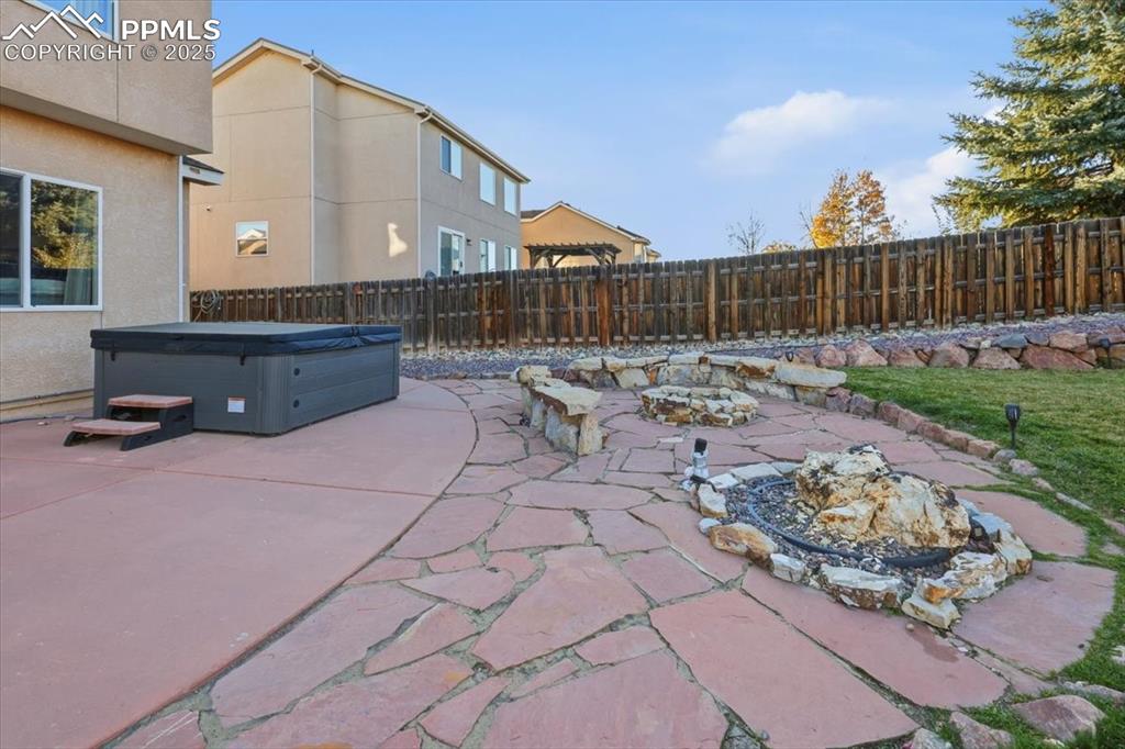 12114 Sleeping Bear Road Peyton, CO 80831 - Photo 38 of 47 a view of a terrace with chairs