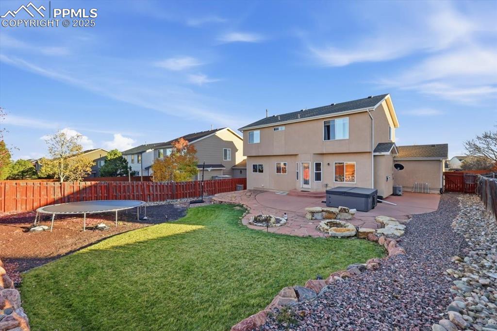 12114 Sleeping Bear Road Peyton, CO 80831 - Photo 40 of 47 a view of a house with a yard
