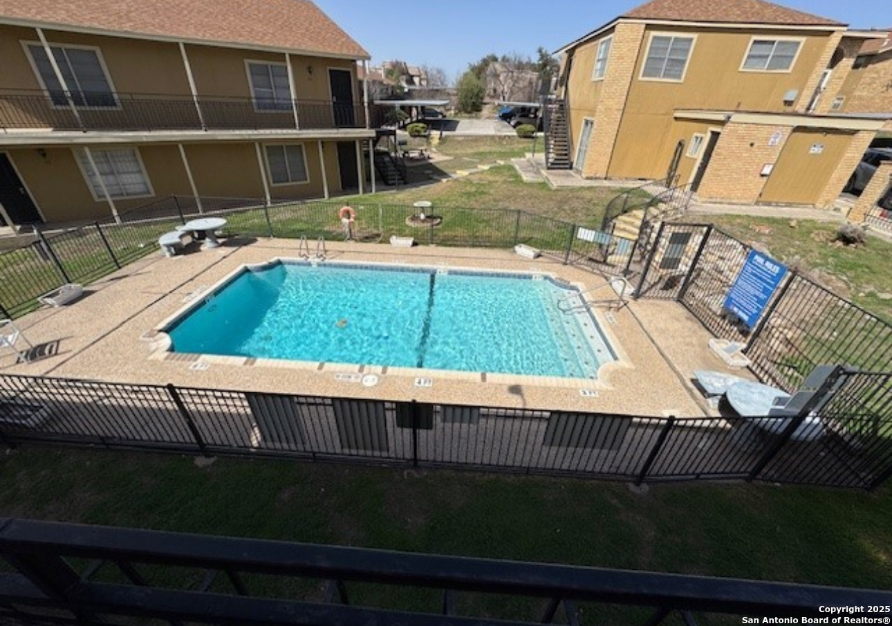 911 Vance Jackson Road, Unit 211 San Antonio, TX 78201 - Photo 8 of 8 a view of a house with backyard and deck