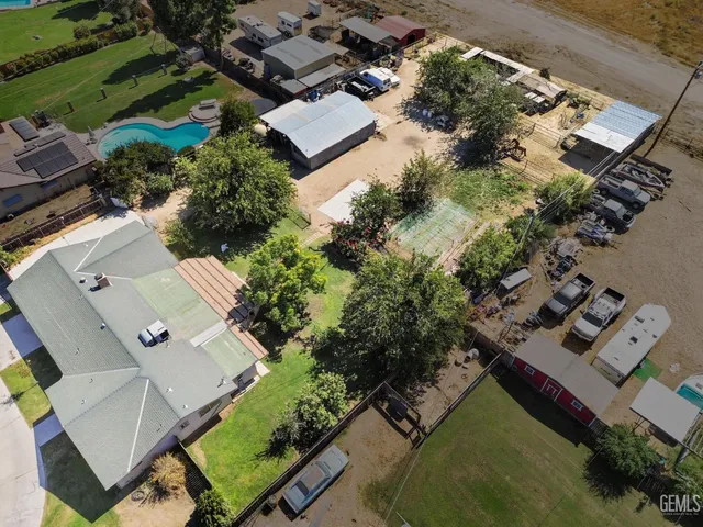 an aerial view of house with yard