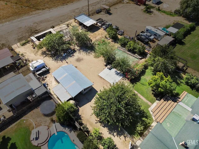 an aerial view of residential house with outdoor space