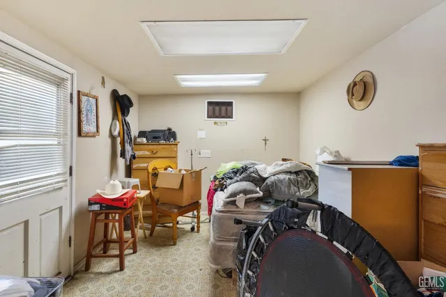 a view of swimming pool with sitting area